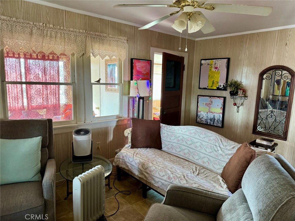 4759 Pinto Mountain Road Twentynine Palms, CA 92277 - Photo 5 of 21 a living room with furniture and a window