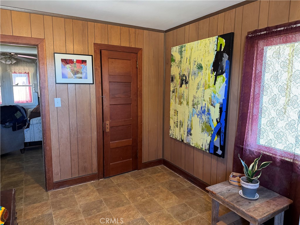 4759 Pinto Mountain Road Twentynine Palms, CA 92277 - Photo 8 of 21 a view of an entryway with furniture and a window