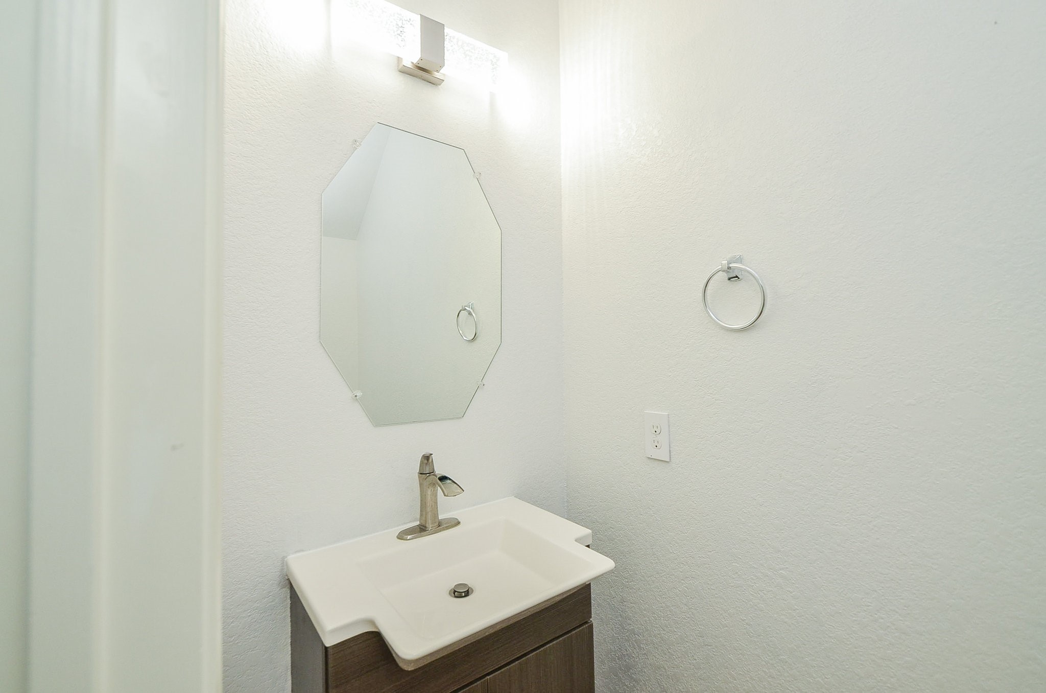3003 Sage Grouse Court Rosenberg, TX 77471 - Photo 22 of 34 a bathroom with a sink and a mirror