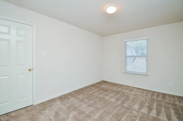 an empty room with a window