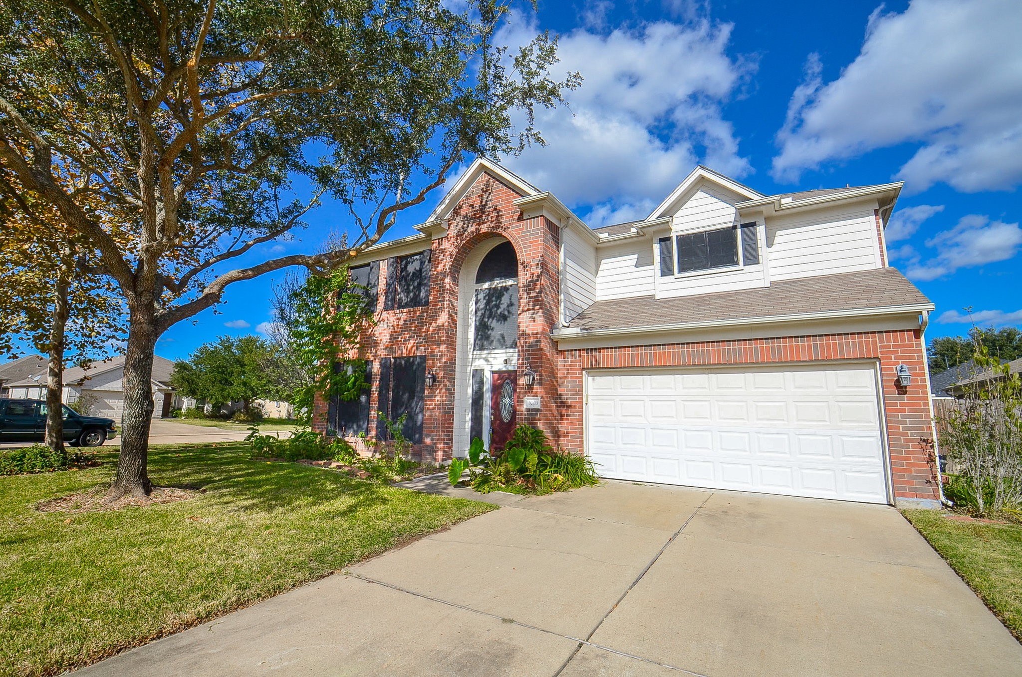 3003 Sage Grouse Court Rosenberg, TX 77471 - Photo 28 of 34 a front view of a house with a yard and garage