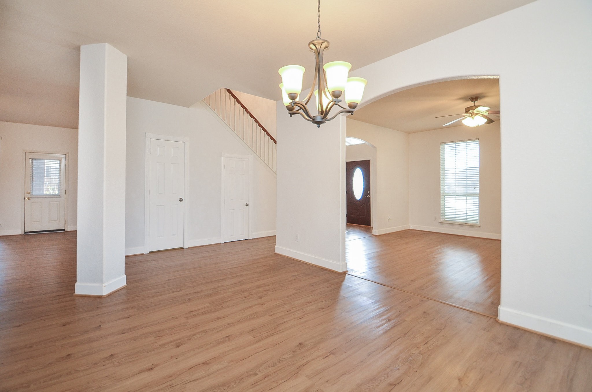 3003 Sage Grouse Court Rosenberg, TX 77471 - Photo 4 of 34 a view of an empty room with wooden floor