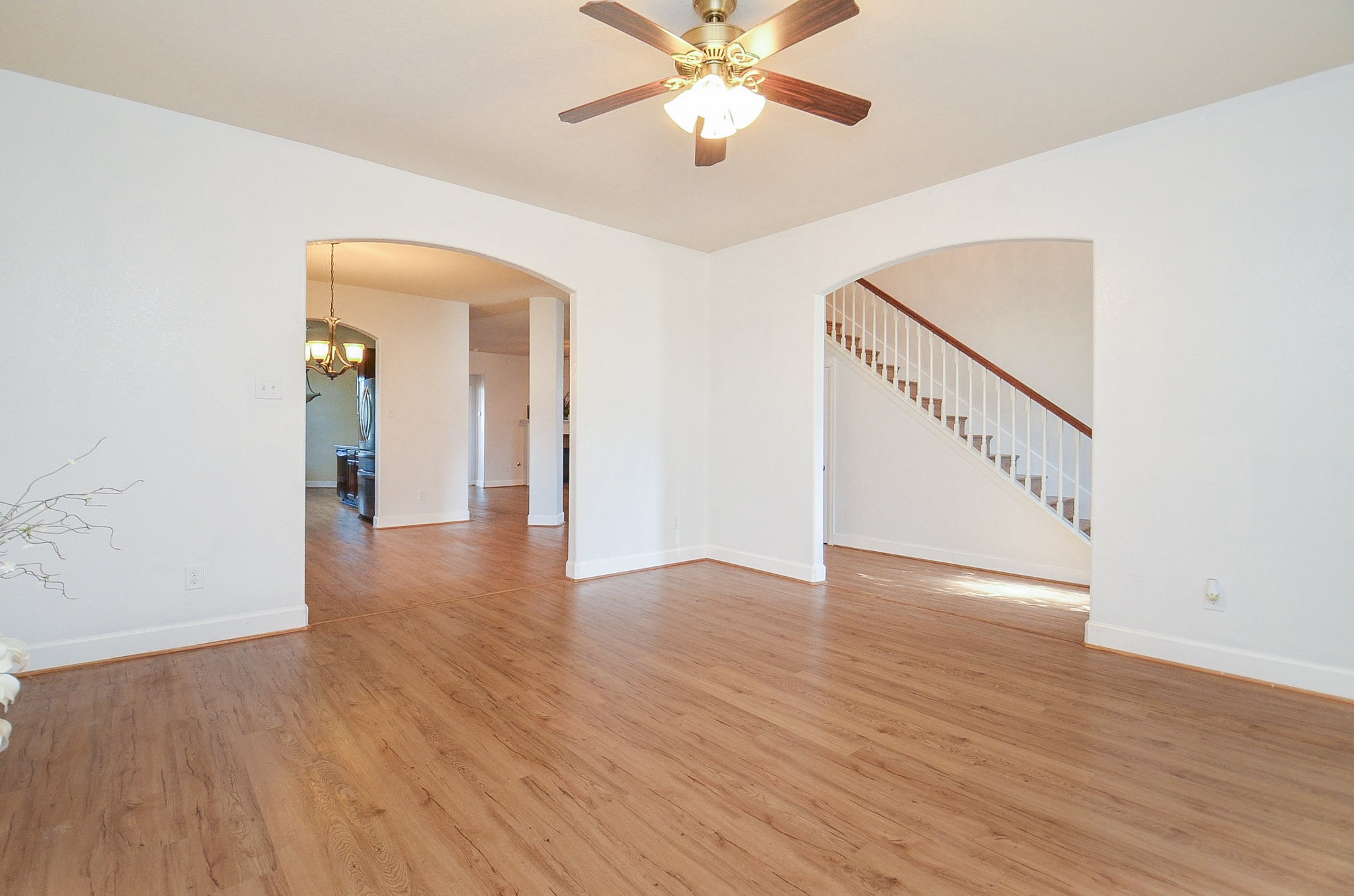 3003 Sage Grouse Court Rosenberg, TX 77471 - Photo 5 of 34 a view of an empty room with wooden floor