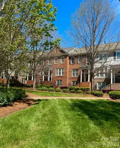 a view of a big yard next to a building
