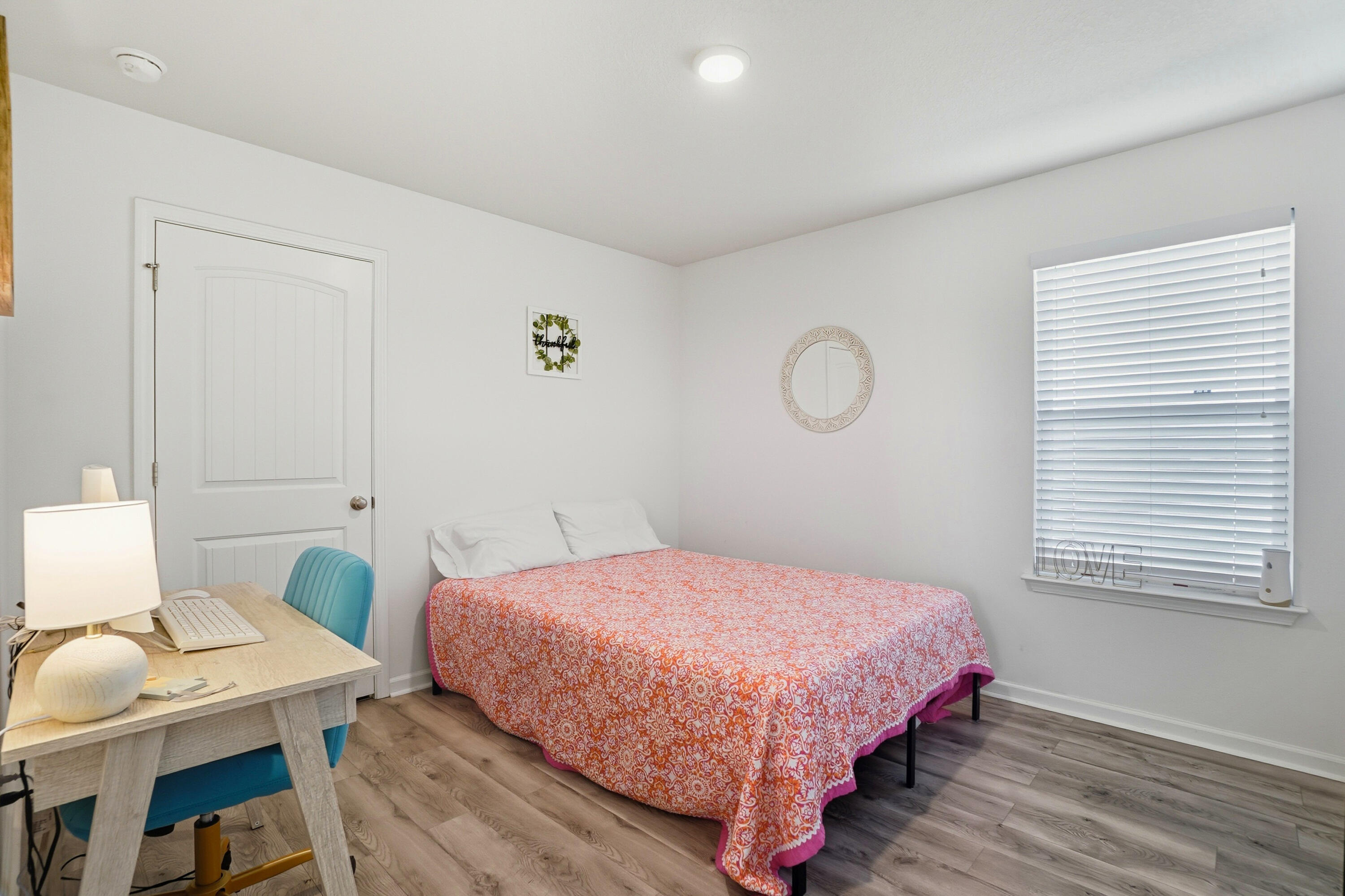 473 Earl Godwin Road Freeport, FL 32439 - Photo 14 of 29 a bedroom with a bed and a window