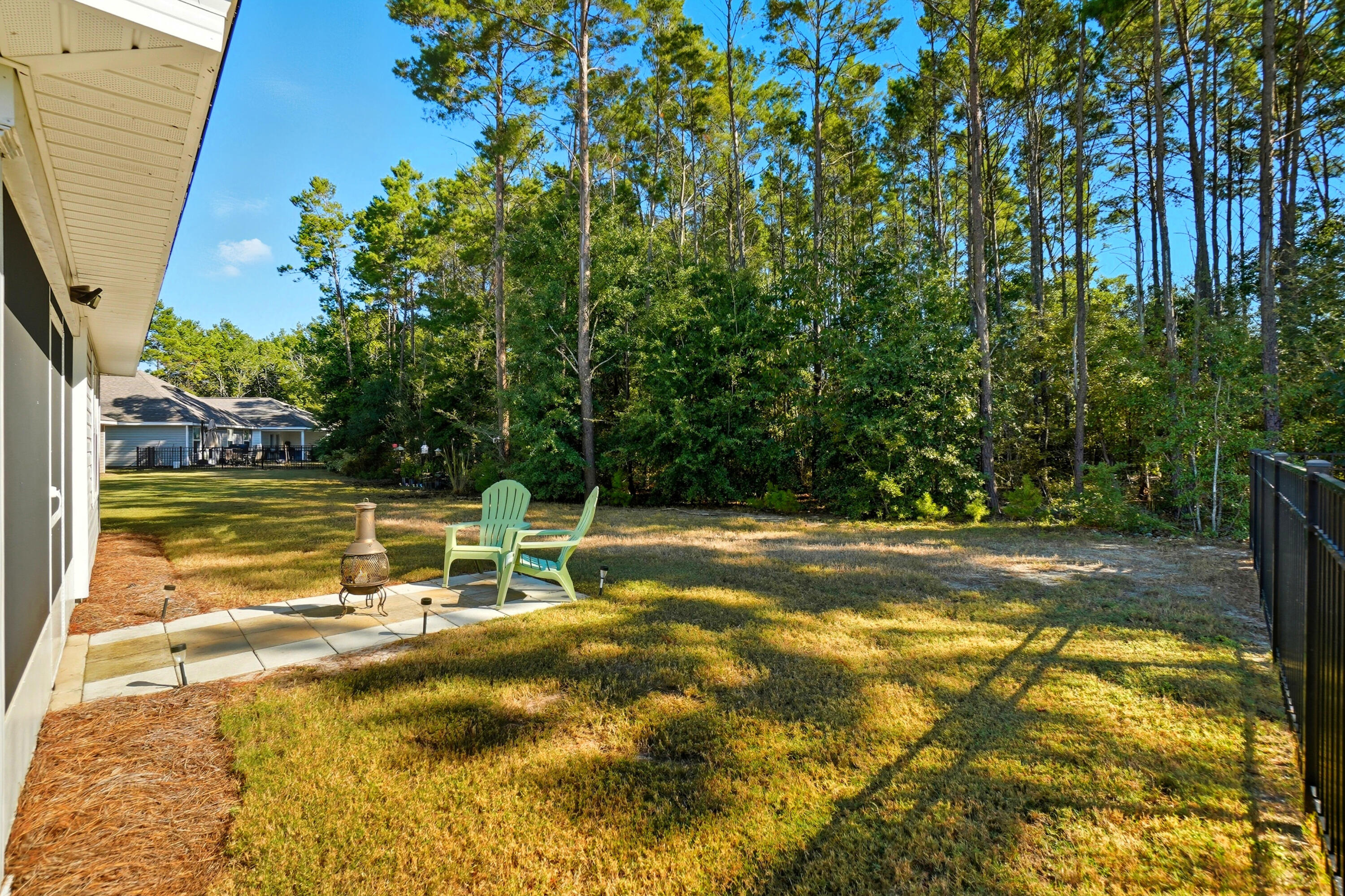 473 Earl Godwin Road Freeport, FL 32439 - Photo 16 of 25 a view of a swimming pool with a yard