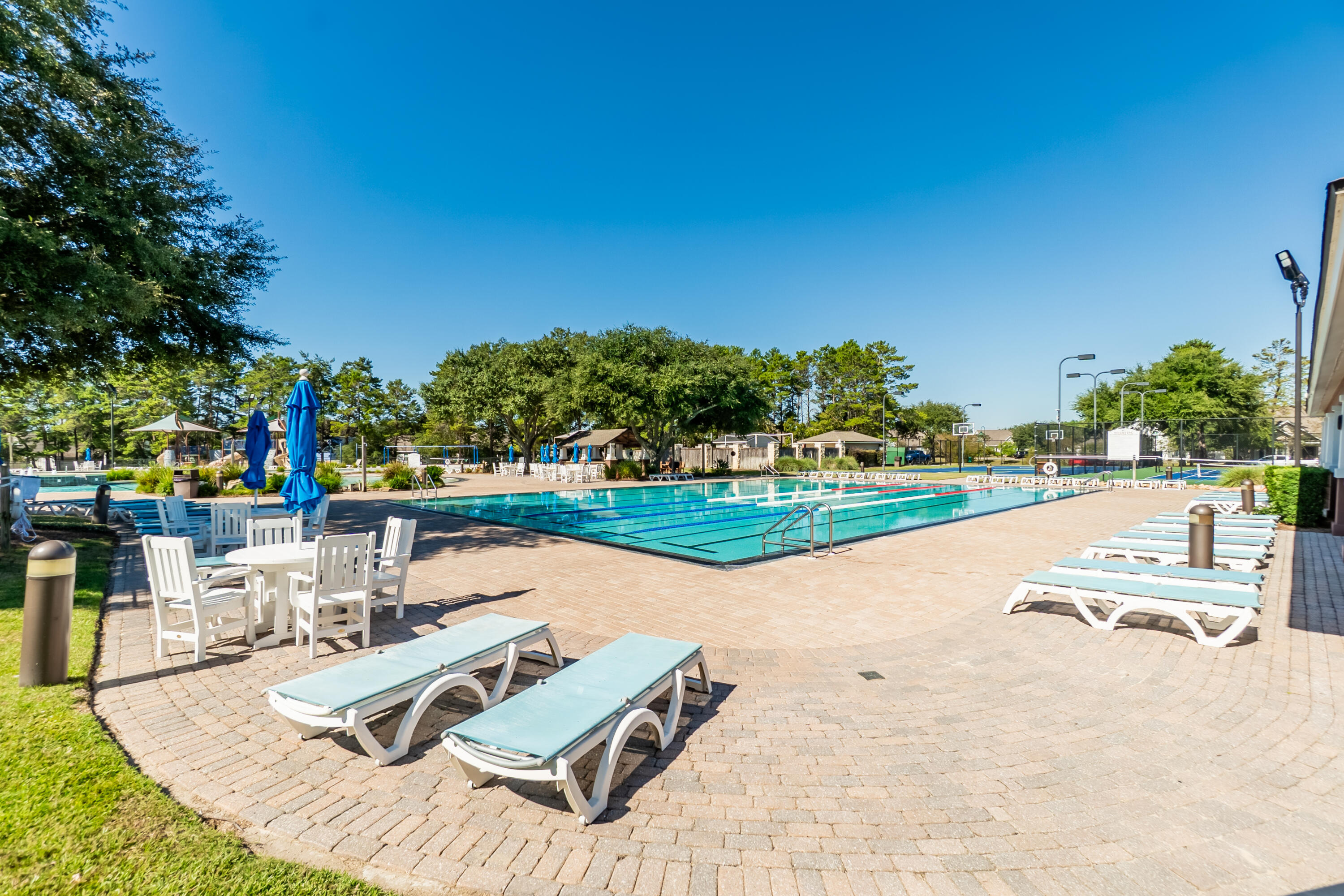 473 Earl Godwin Road Freeport, FL 32439 - Photo 20 of 25 a view of a swimming pool with lounge chairs