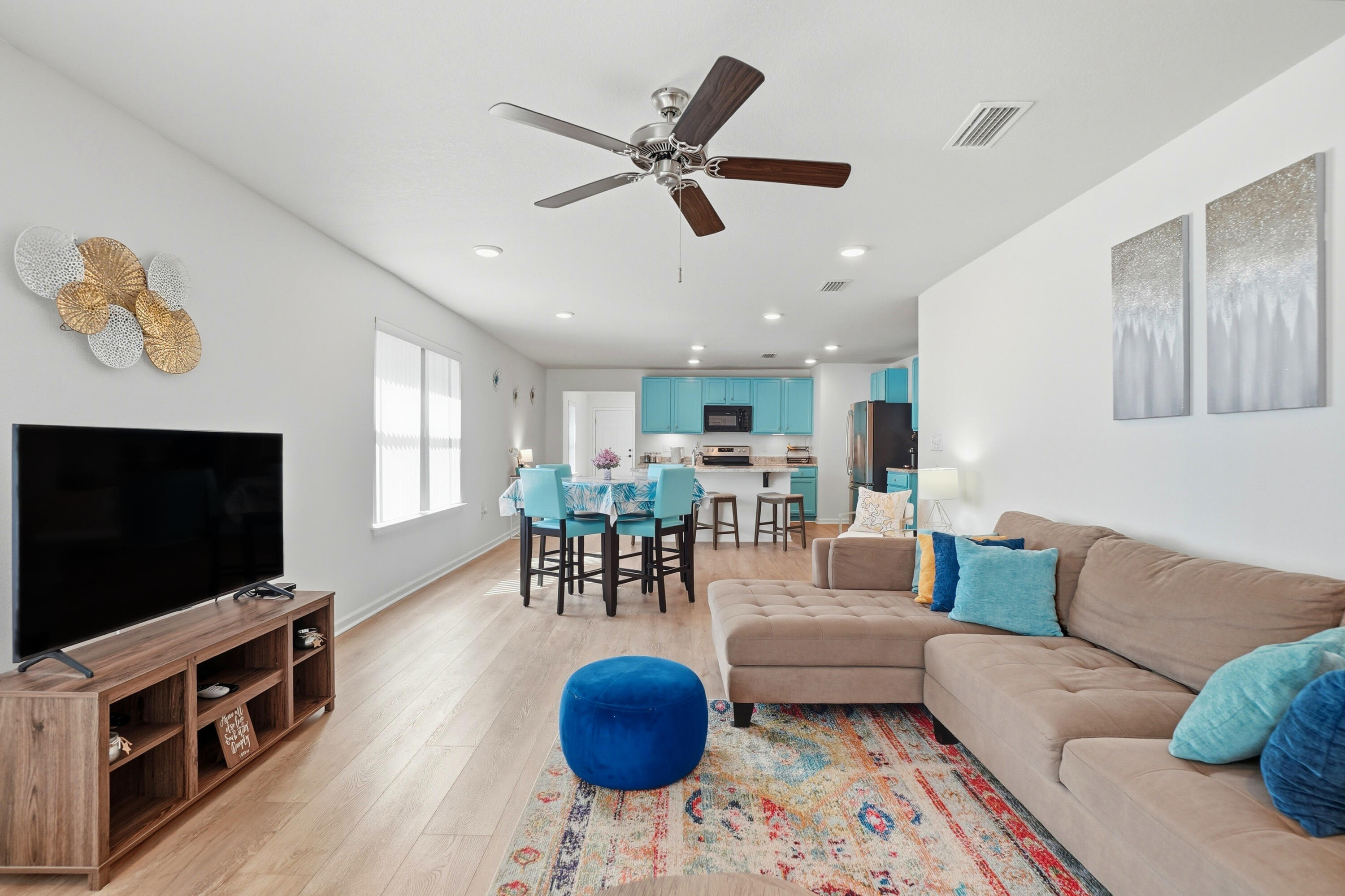 473 Earl Godwin Road Freeport, FL 32439 - Photo 5 of 29 a living room with furniture and a flat screen tv