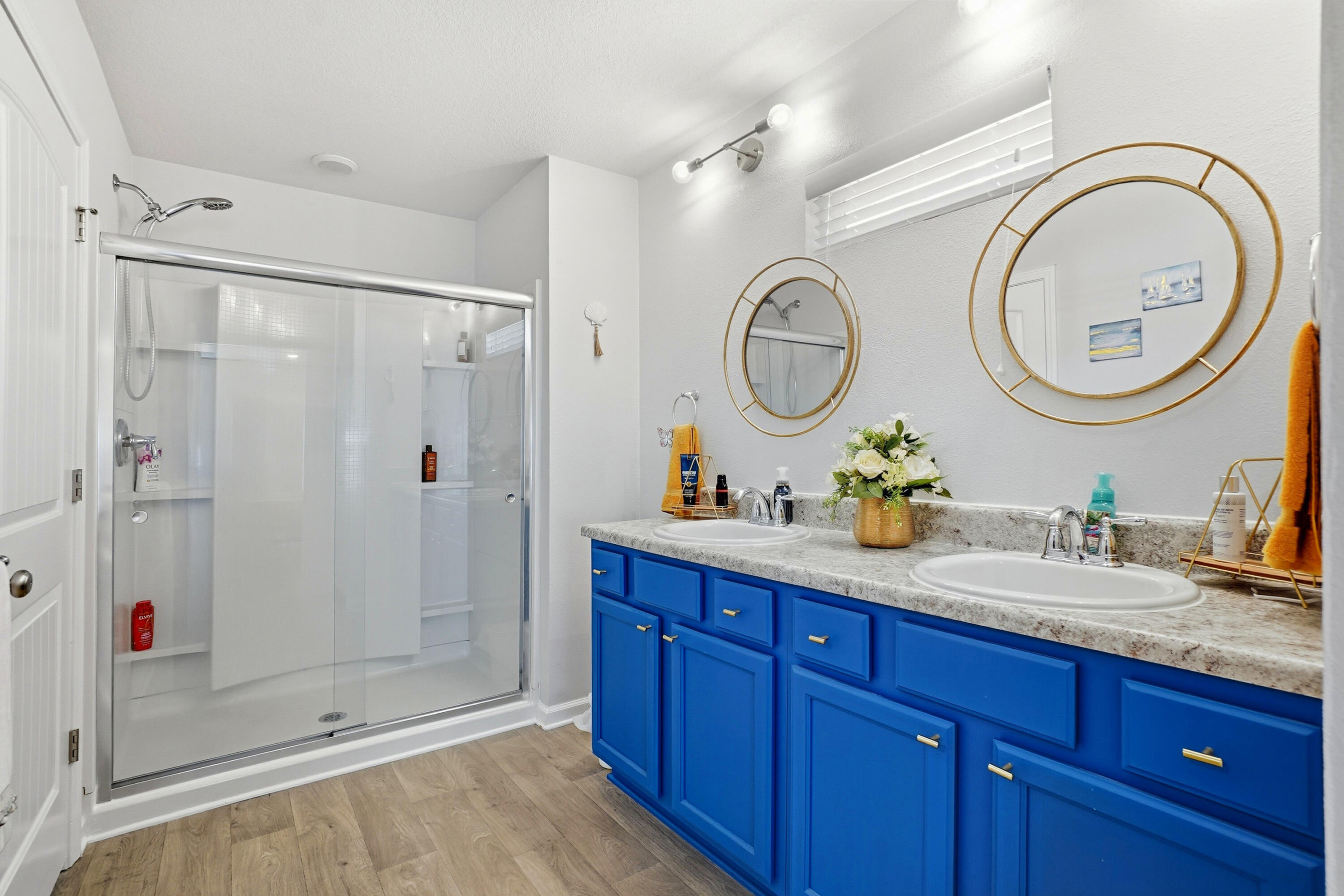 473 Earl Godwin Road Freeport, FL 32439 - Photo 10 of 29 a bathroom with a granite countertop sink and a mirror
