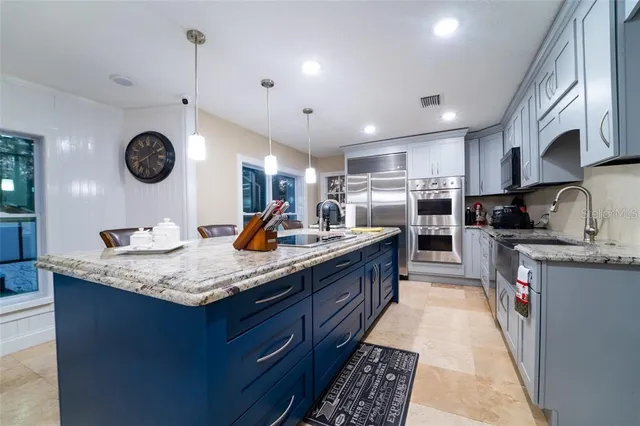 $1,050,000 | 4627 Woodlot Court, Orlando, FL 32835