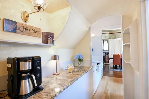 a view of a kitchen from a dining room