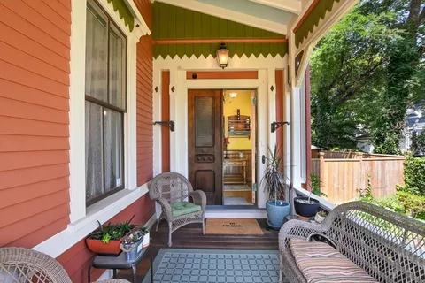 a outdoor living space with furniture and a potted plant