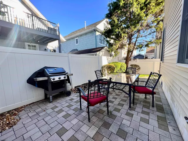 swimming pool view with a outdoor seating