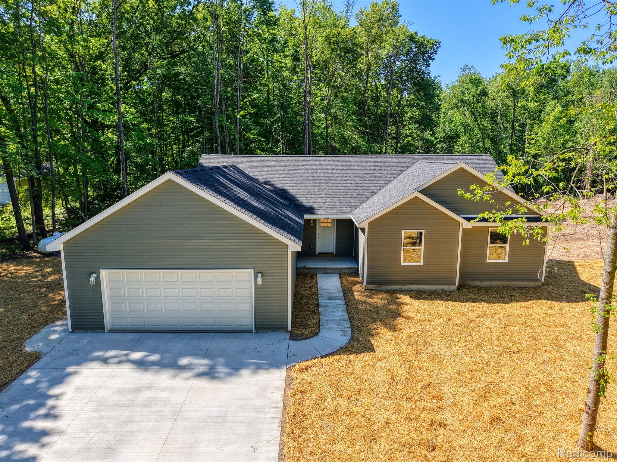 10551 West Allen Road Fowlerville, MI 48836 - Photo 1 of 34 DJI_20260603110414_0428_D_1.jpg