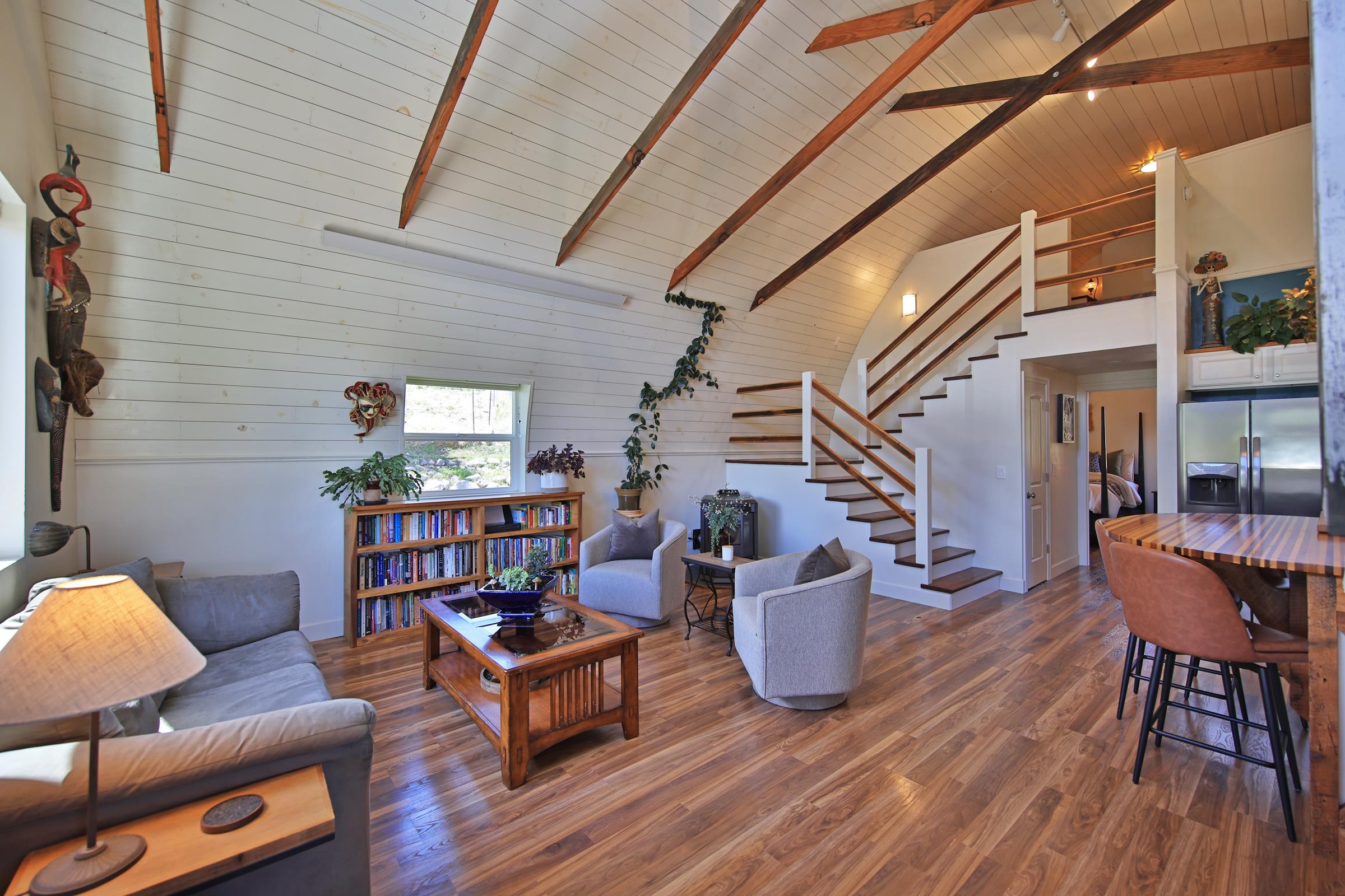 57191 Me Road Collbran, CO 81624 - Photo 12 of 42 a living room with furniture and a wooden floor
