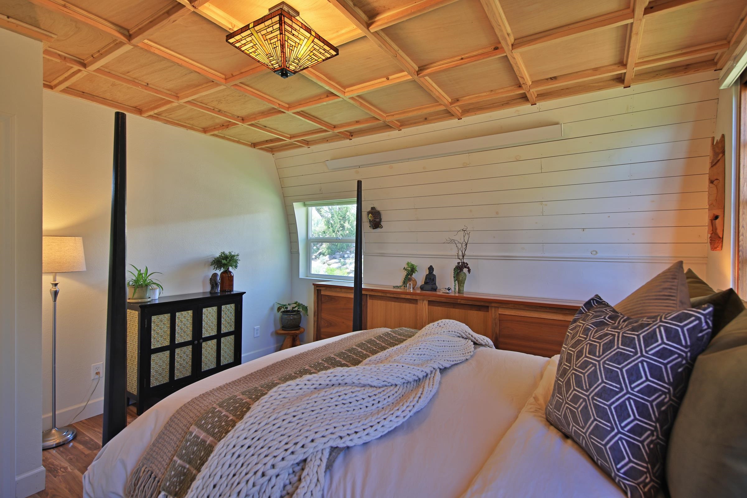 57191 Me Road Collbran, CO 81624 - Photo 20 of 42 a bedroom with bed and a window