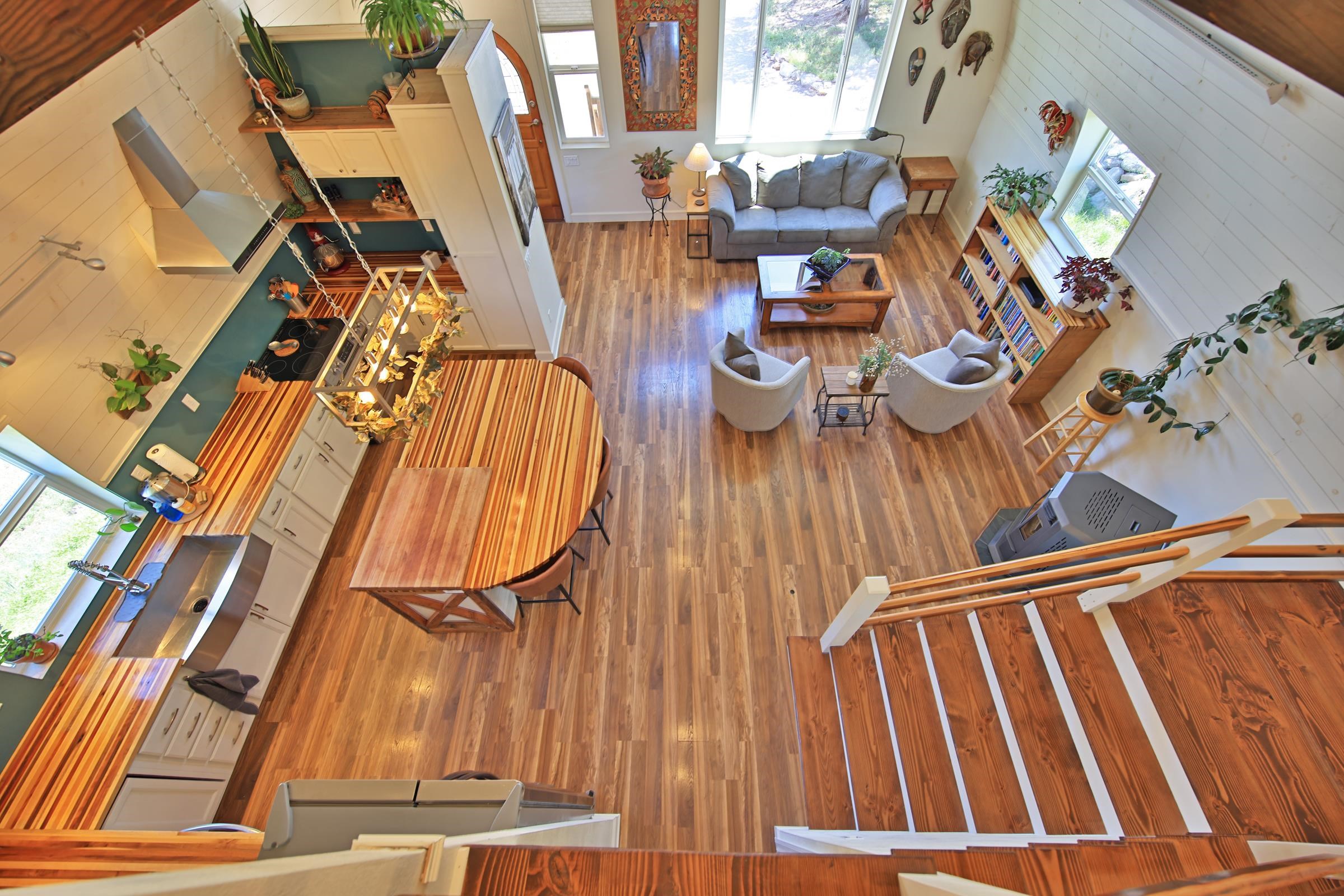 57191 Me Road Collbran, CO 81624 - Photo 25 of 42 a view of living room with furniture and wooden floor