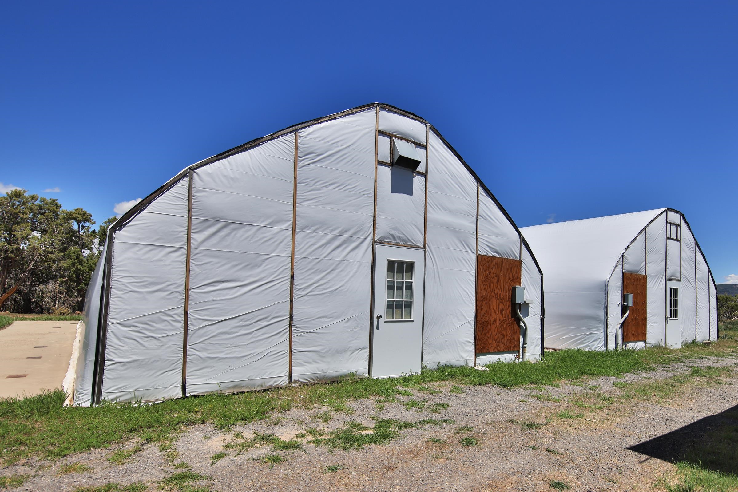 57191 Me Road Collbran, CO 81624 - Photo 31 of 42 a view of a house with a yard