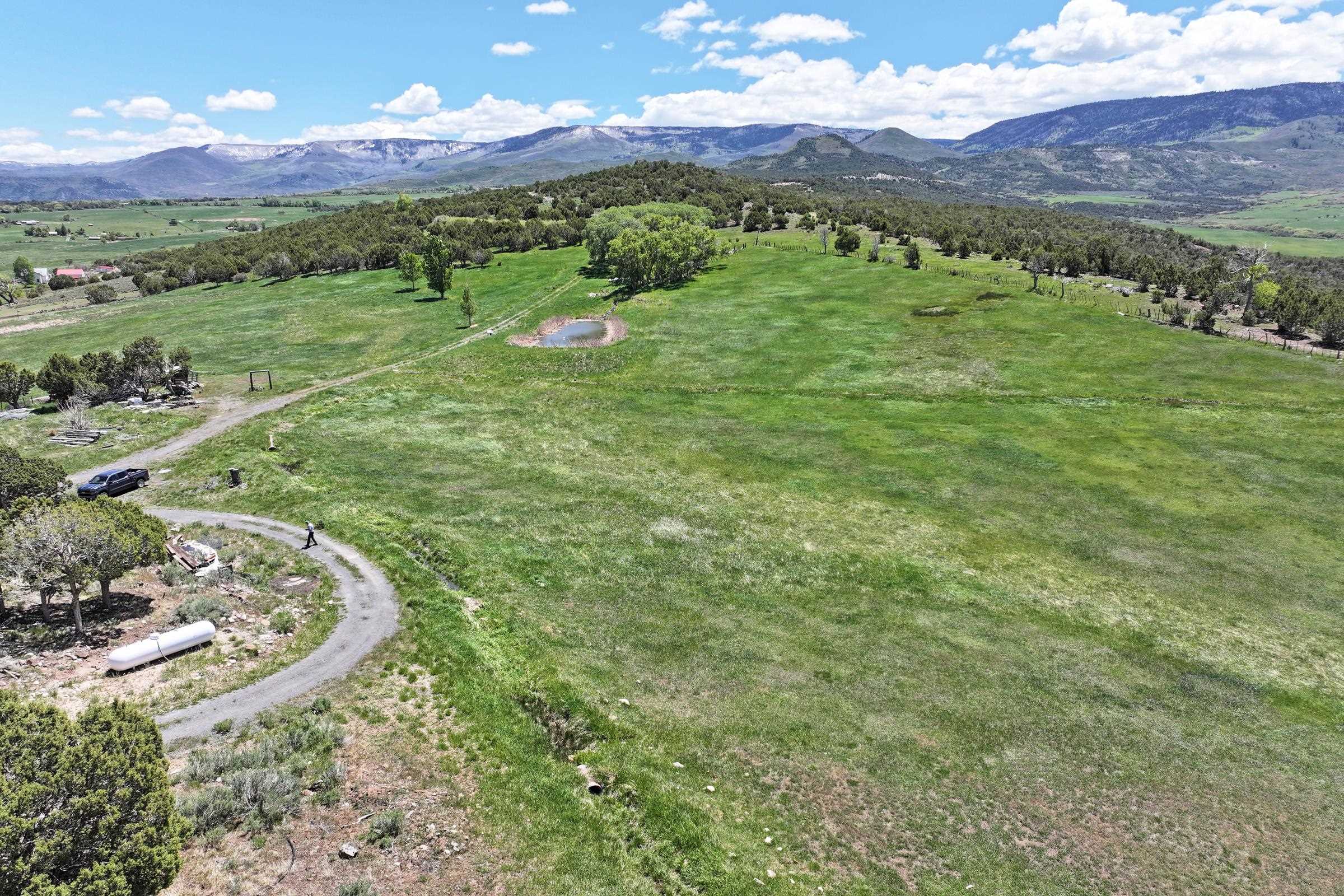 57191 Me Road Collbran, CO 81624 - Photo 37 of 42 a view of a mountain with an outdoor space