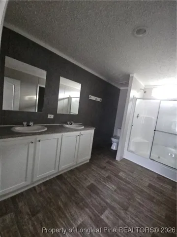 a view of a sink and a mirror