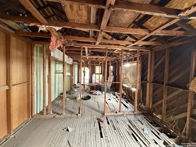 a view of a porch with seating space