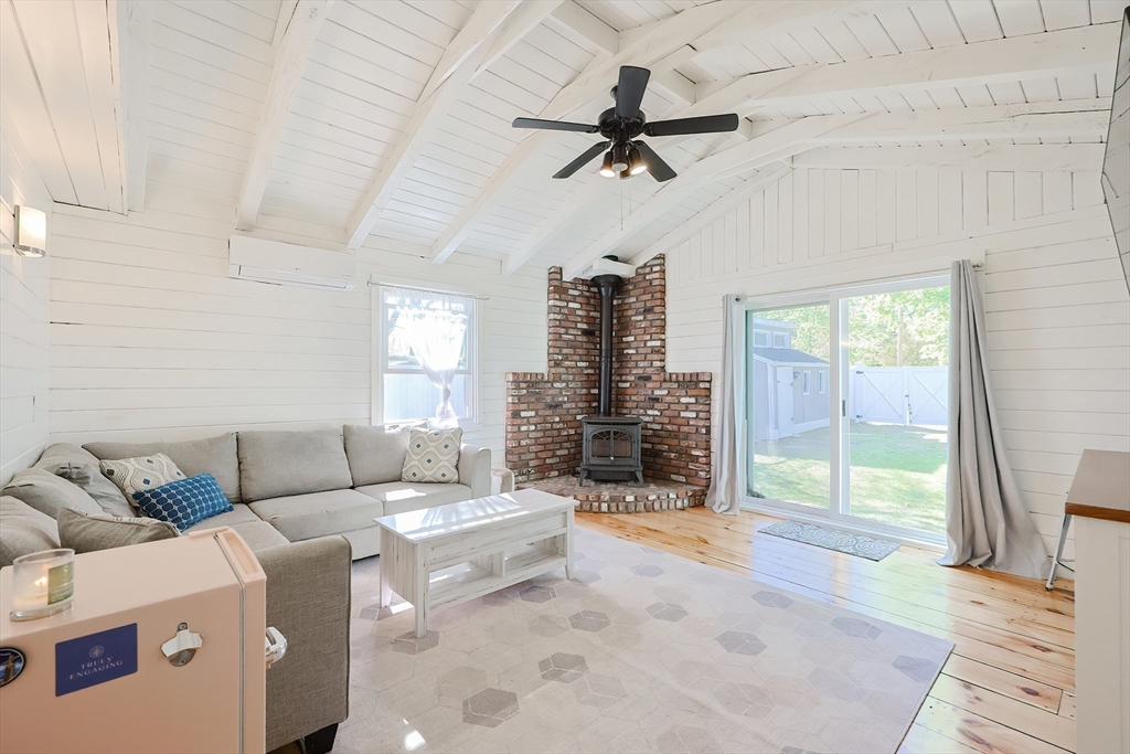 321 Shears Street Wrentham, MA 02093 - Photo 13 of 39 a living room with furniture and a window