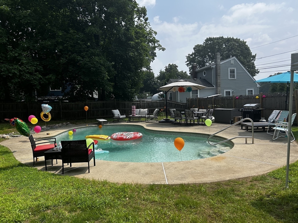 321 Shears Street Wrentham, MA 02093 - Photo 37 of 39 an outdoor space with swimming pool and furniture