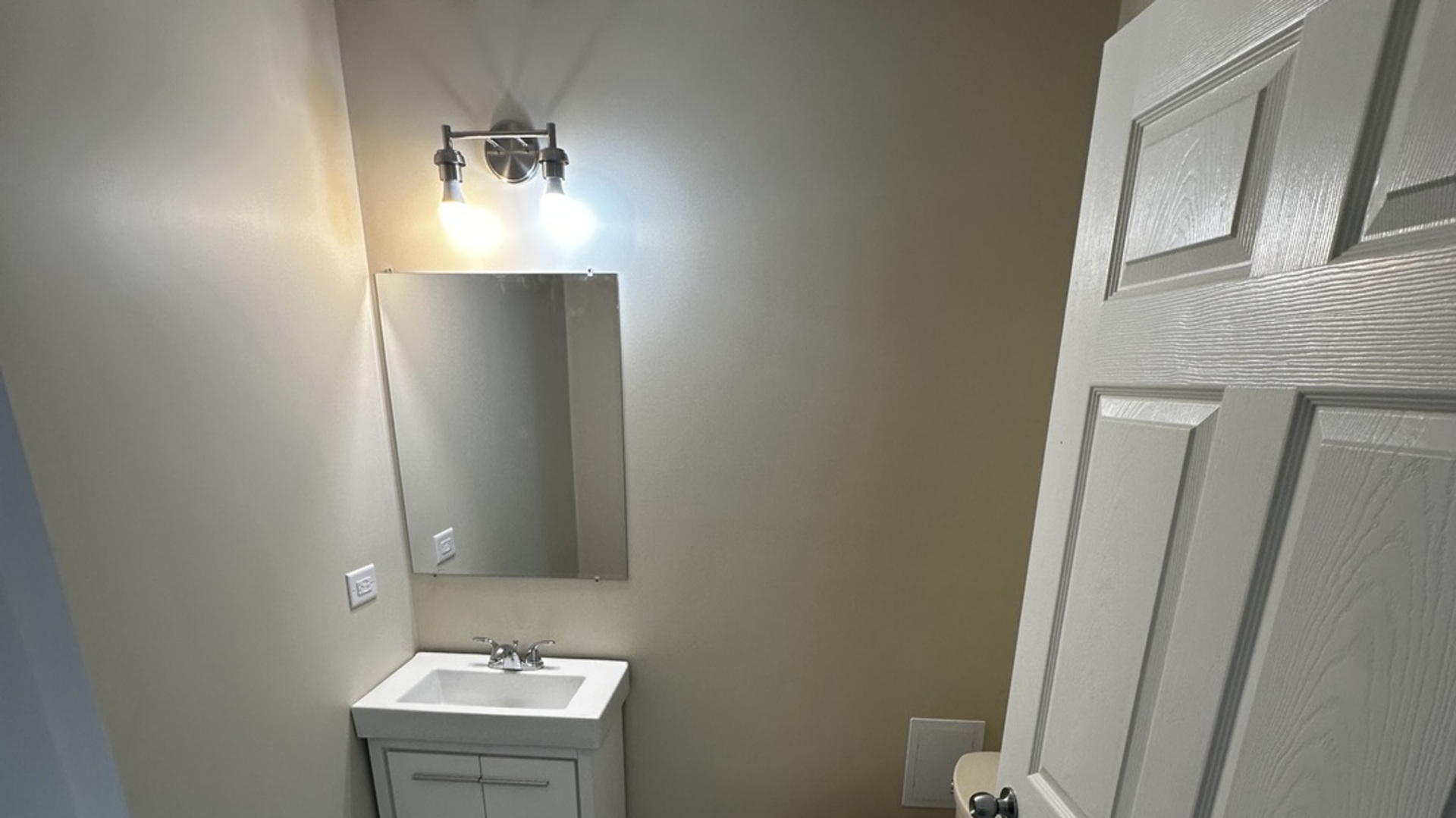 710 1/2 Liberty Street Morris, IL 60450 - Photo 8 of 10 a bathroom with a sink and mirror