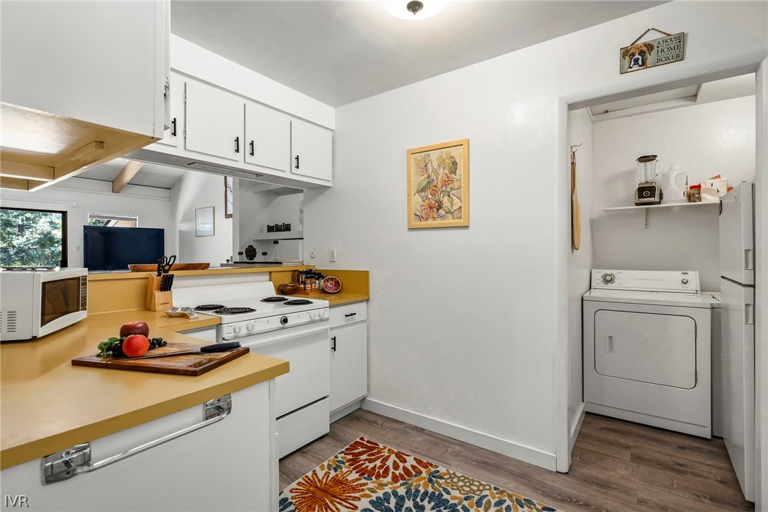 321 Ski Way, Unit 137 Incline Village, NV 89451 - Photo 5 of 21 a kitchen with a sink cabinets and wooden floor