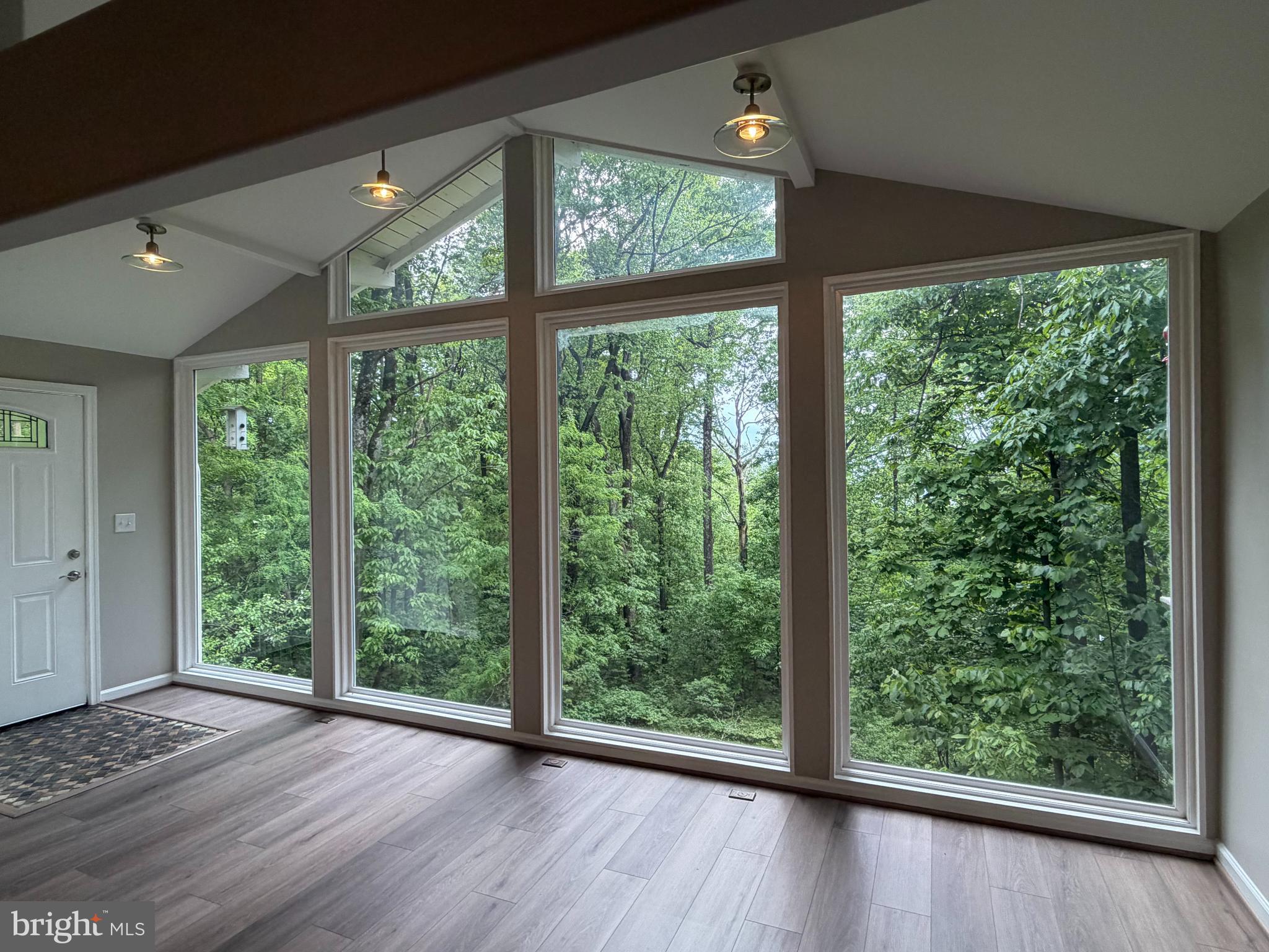 146 Trillium Trail Road Linden, VA 22642 - Photo 3 of 21 a view of a room with wooden floor and balcony