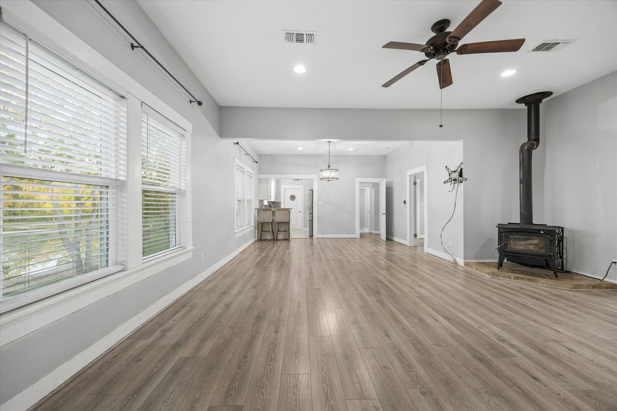 10347 Pless Road Cat Spring, TX 78933 - Photo 7 of 41 Spacious, open concept living space with a wood burning stove.