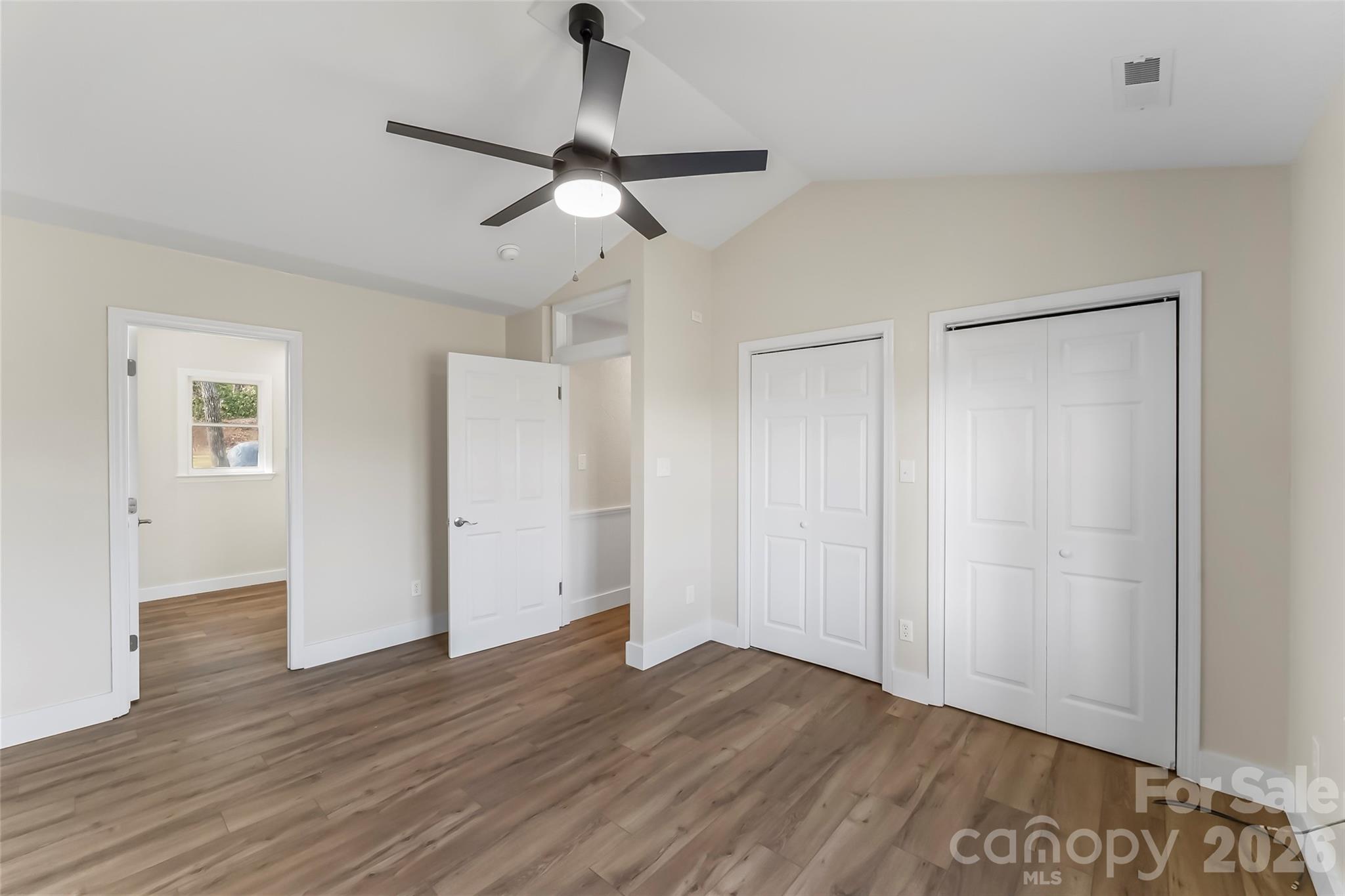 99 Hawkins Road Marion, NC 28752 - Photo 19 of 39 a view of empty room with wooden floor