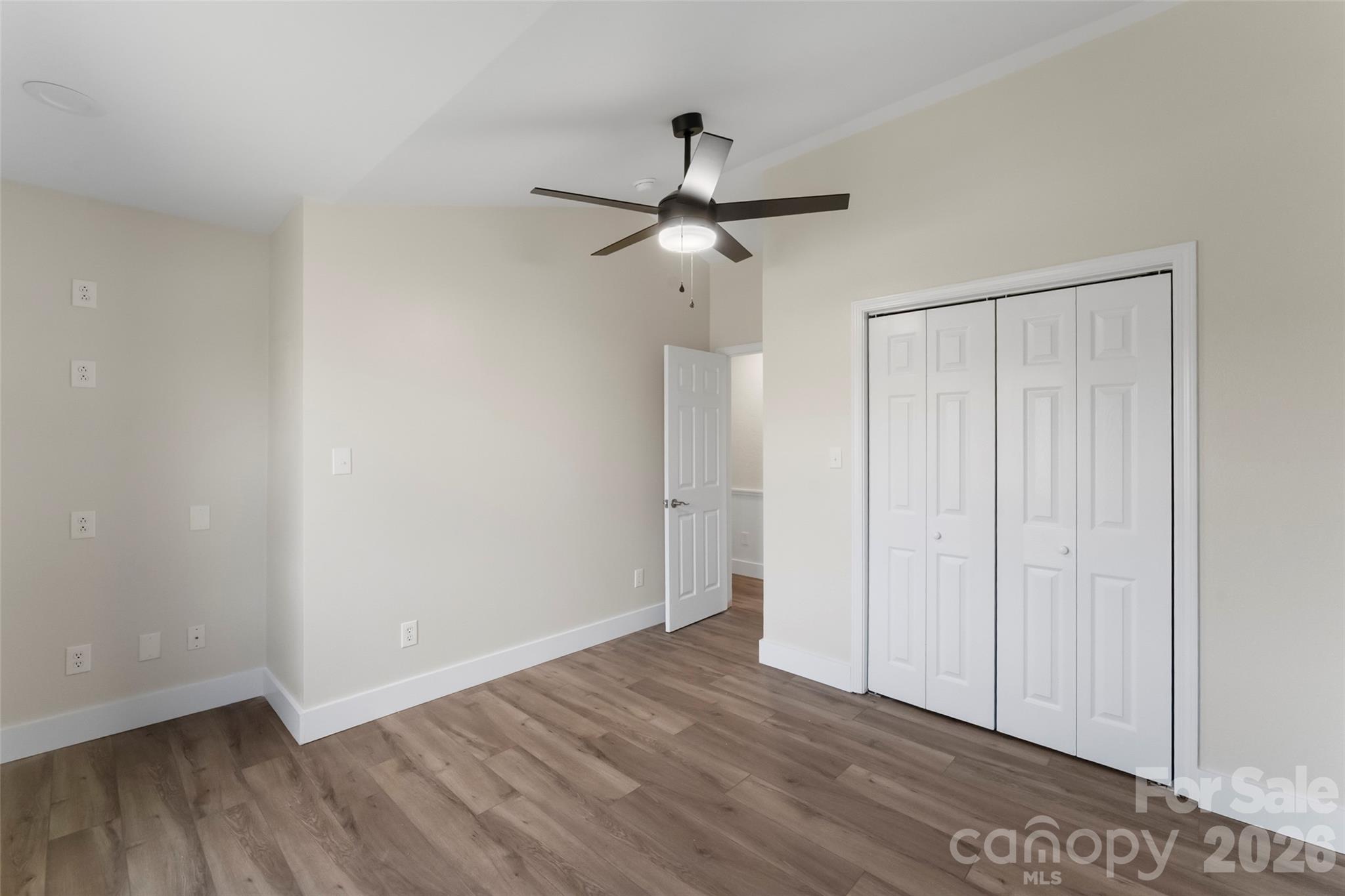 99 Hawkins Road Marion, NC 28752 - Photo 24 of 39 a view of an empty room with wooden floor