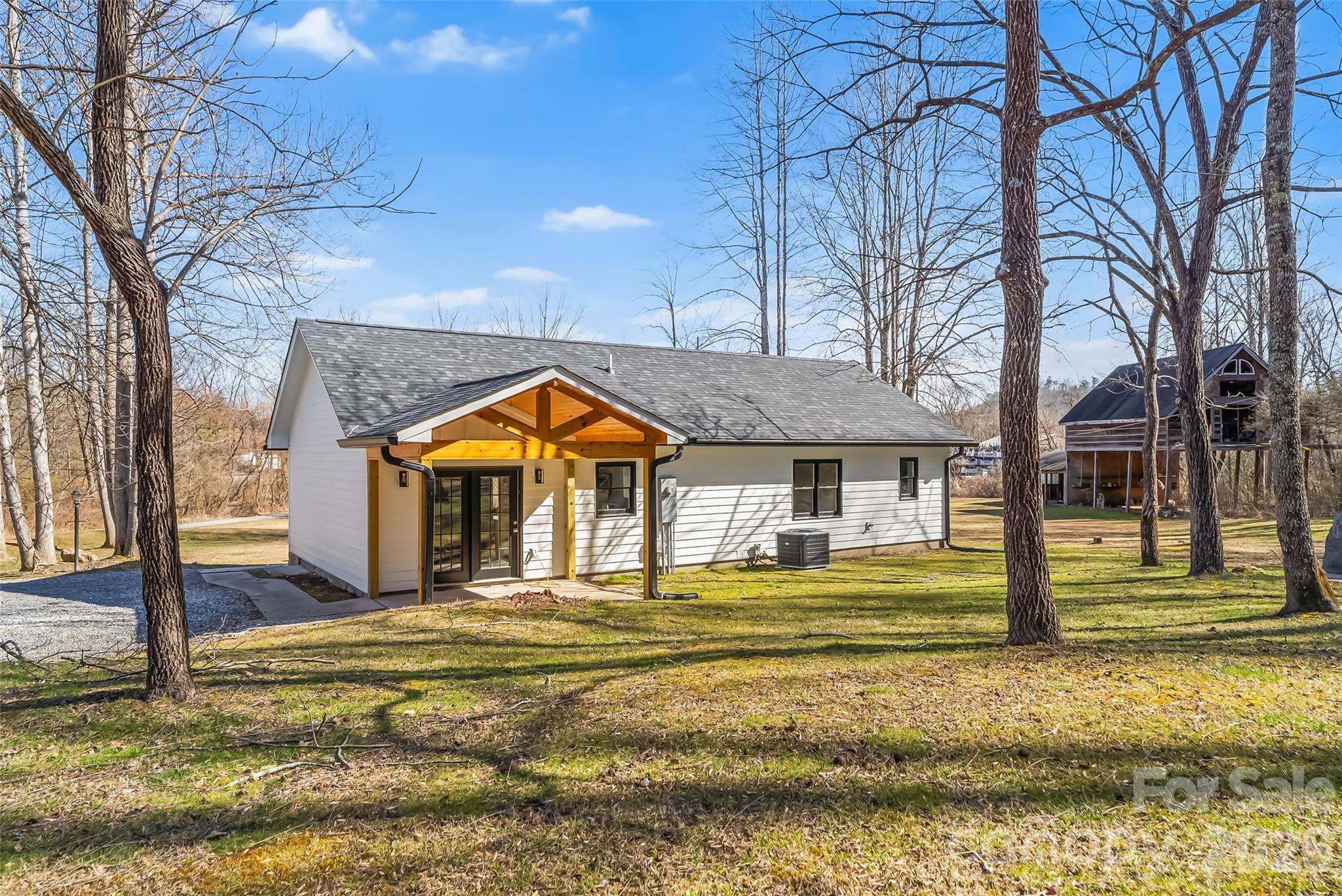 99 Hawkins Road Marion, NC 28752 - Photo 32 of 39 a view of a house with a swimming pool