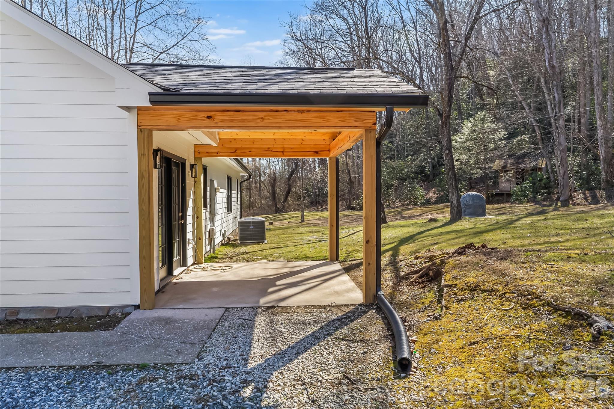 99 Hawkins Road Marion, NC 28752 - Photo 33 of 39 a view of a porch with a table and chairs