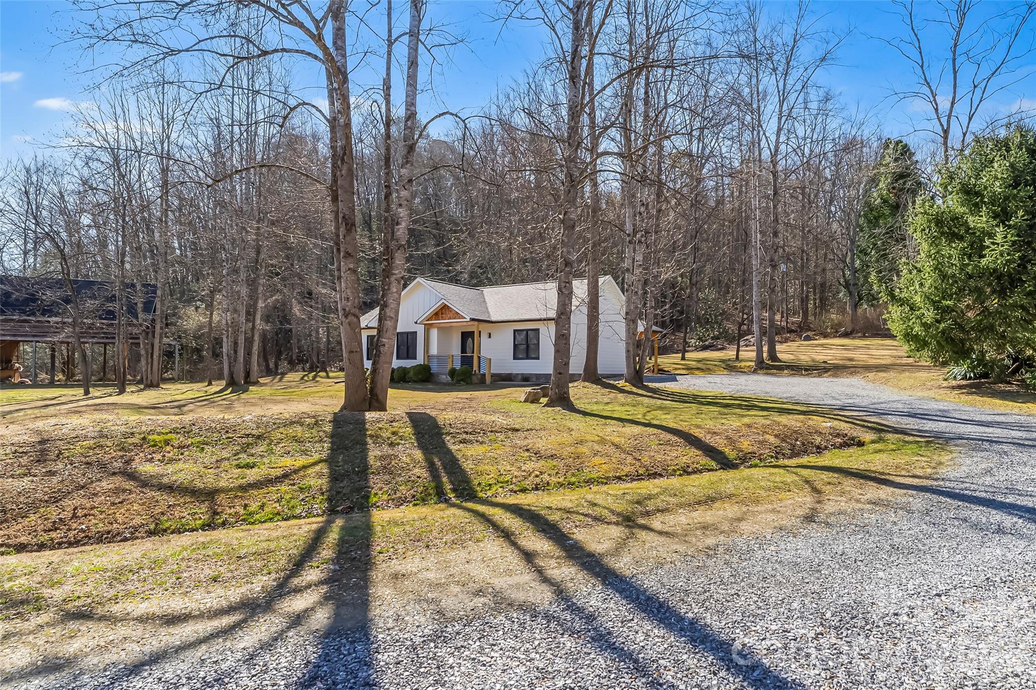 99 Hawkins Road Marion, NC 28752 - Photo 34 of 39 a view of a house with snow on the road