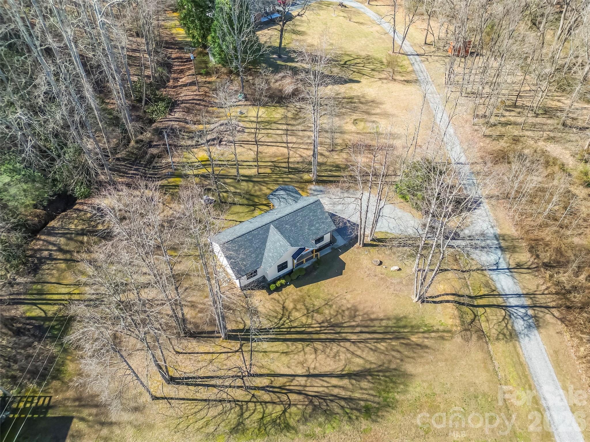 99 Hawkins Road Marion, NC 28752 - Photo 38 of 39 a bench sitting on top of a wooden floor