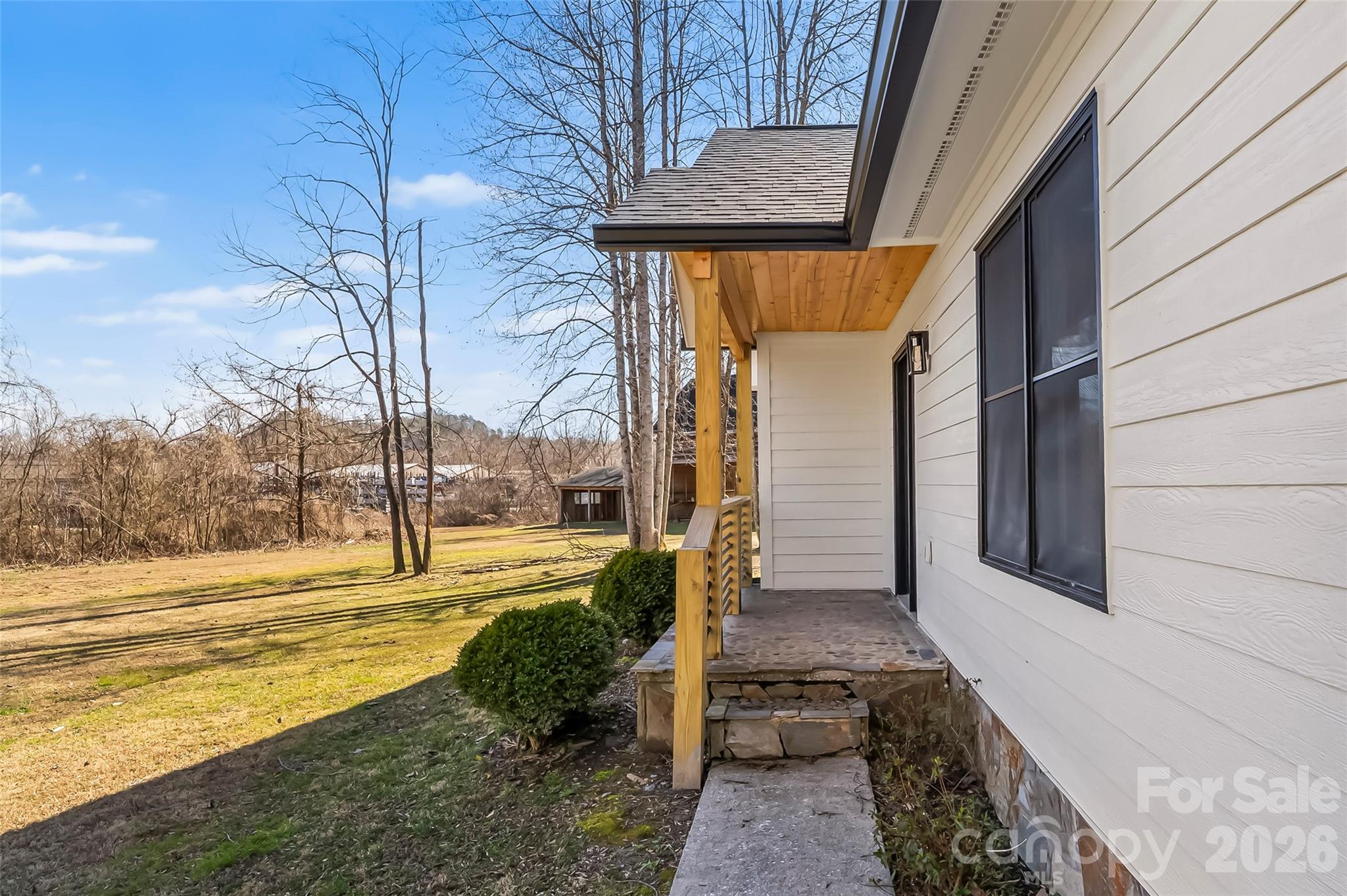99 Hawkins Road Marion, NC 28752 - Photo 4 of 39 a view of a house with a yard