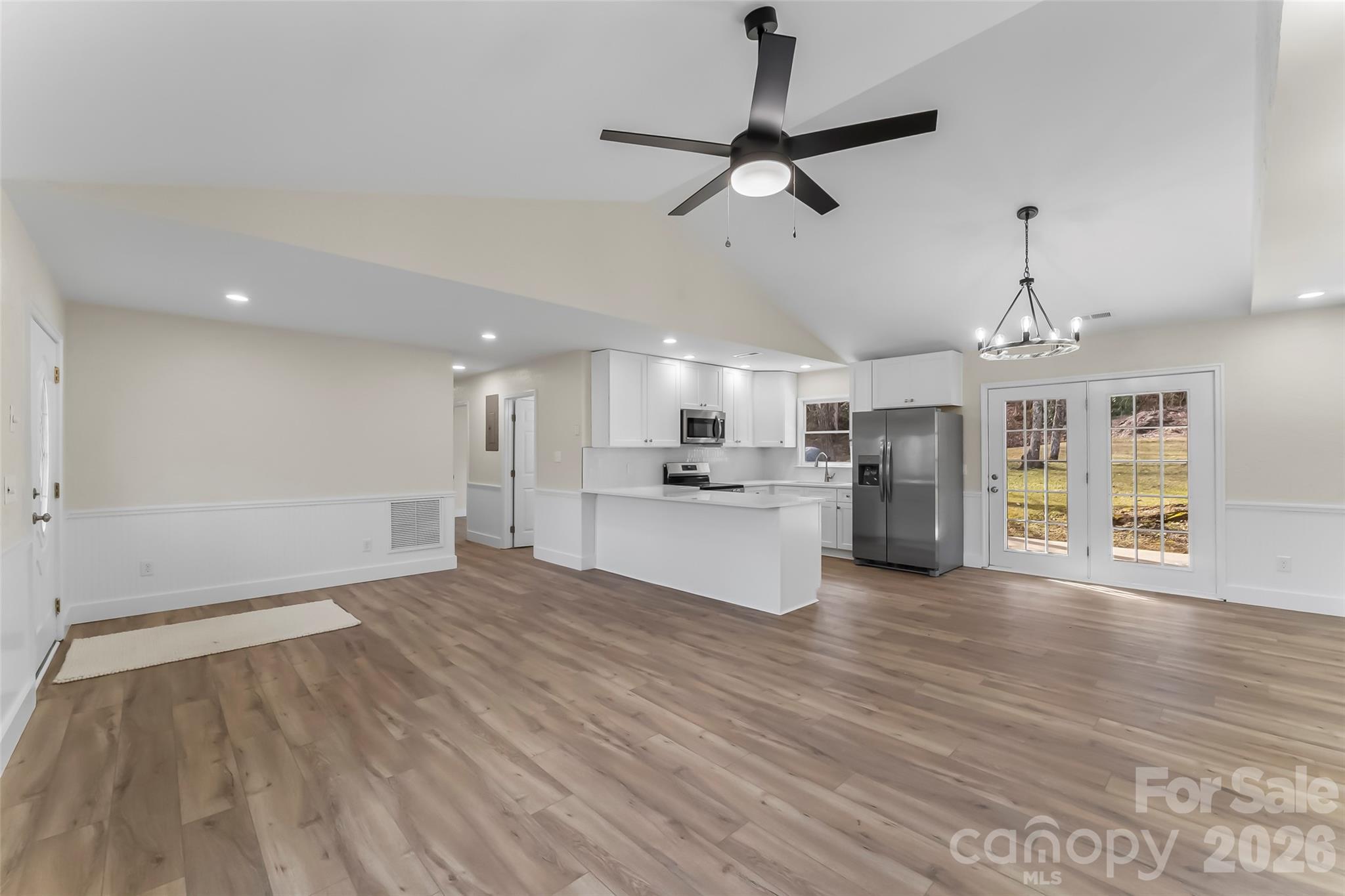 99 Hawkins Road Marion, NC 28752 - Photo 7 of 39 a view of a kitchen with wooden floor and a kitchen