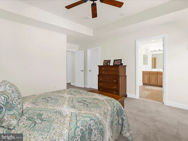 a bedroom with a bed and a cabinets