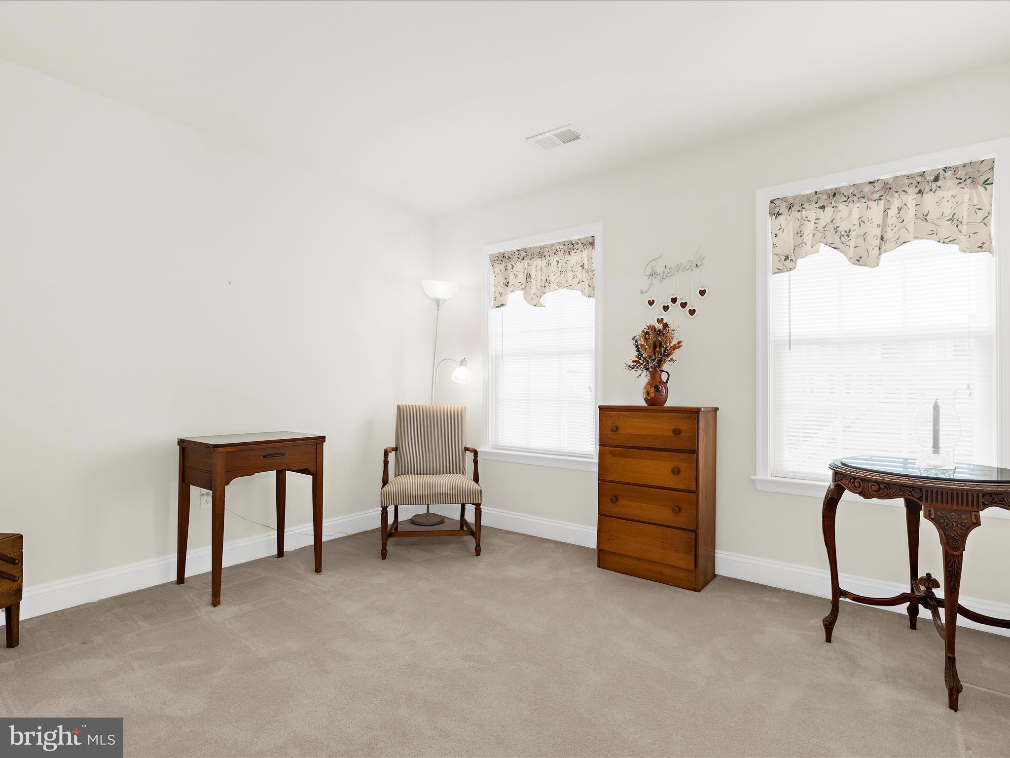 7659 Porcelain Tile Court Odenton, MD 21113 - Photo 26 of 49 a view of a livingroom with furniture and a window