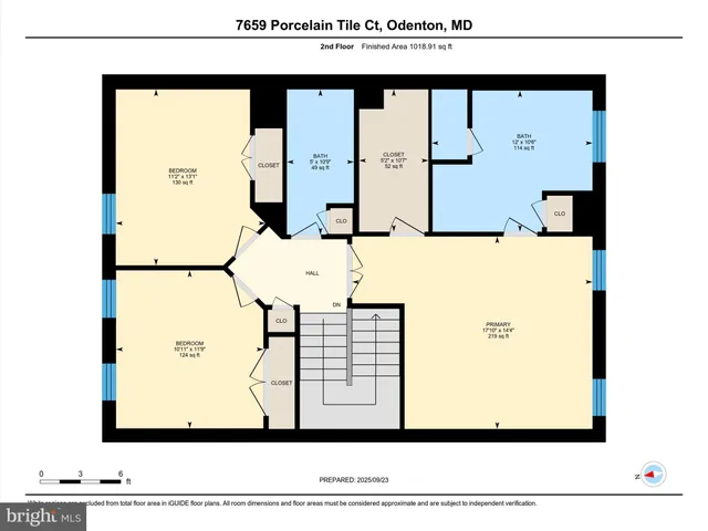 a view of a city with mountains in the background