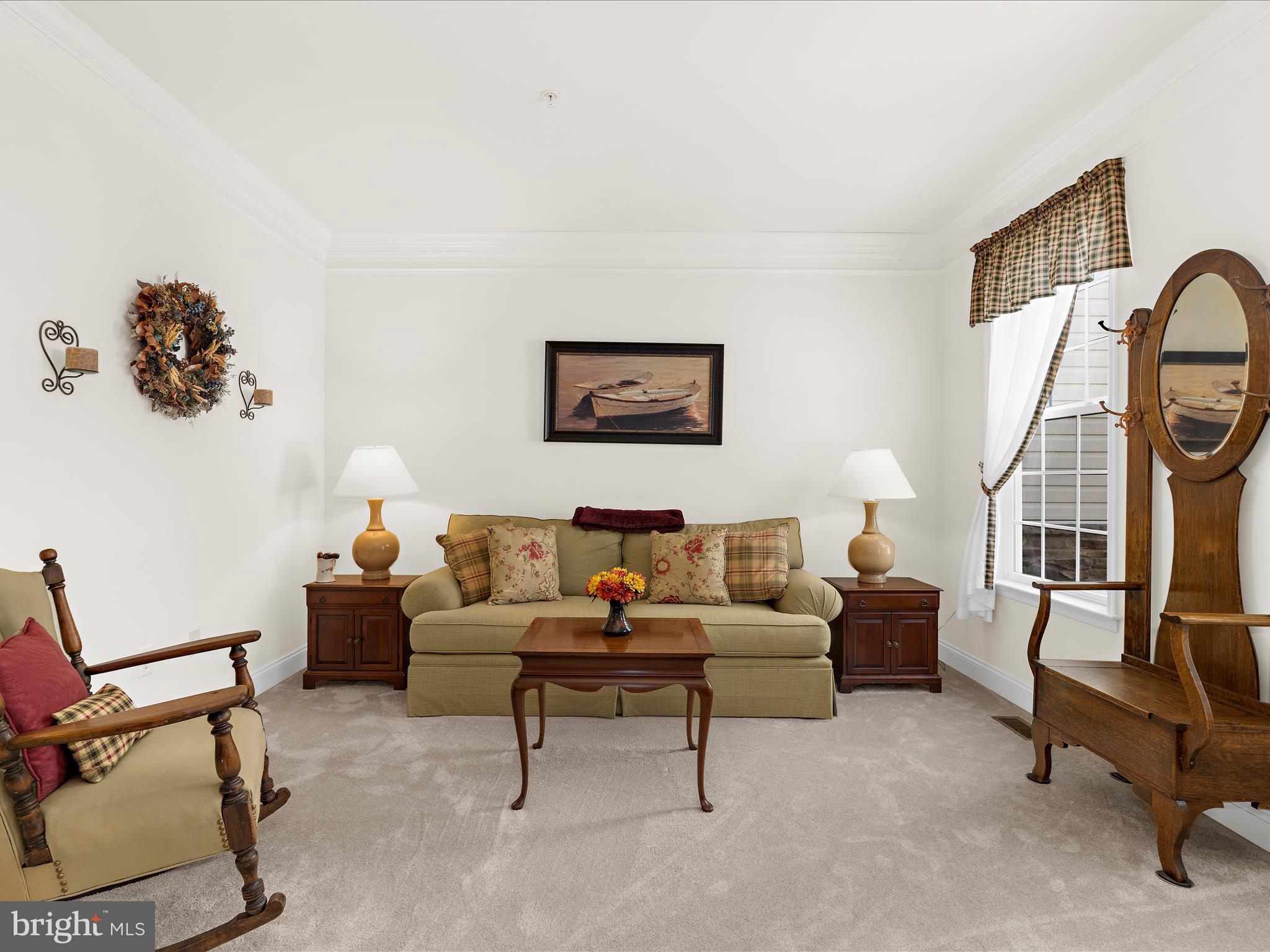 7659 Porcelain Tile Court Odenton, MD 21113 - Photo 6 of 49 a living room with furniture and a window