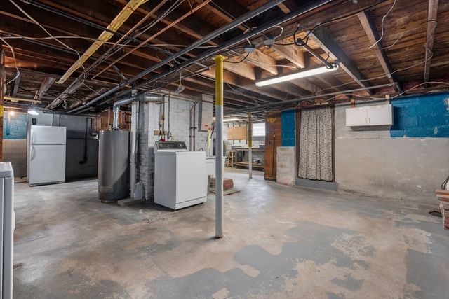 a view of a room with refrigerator