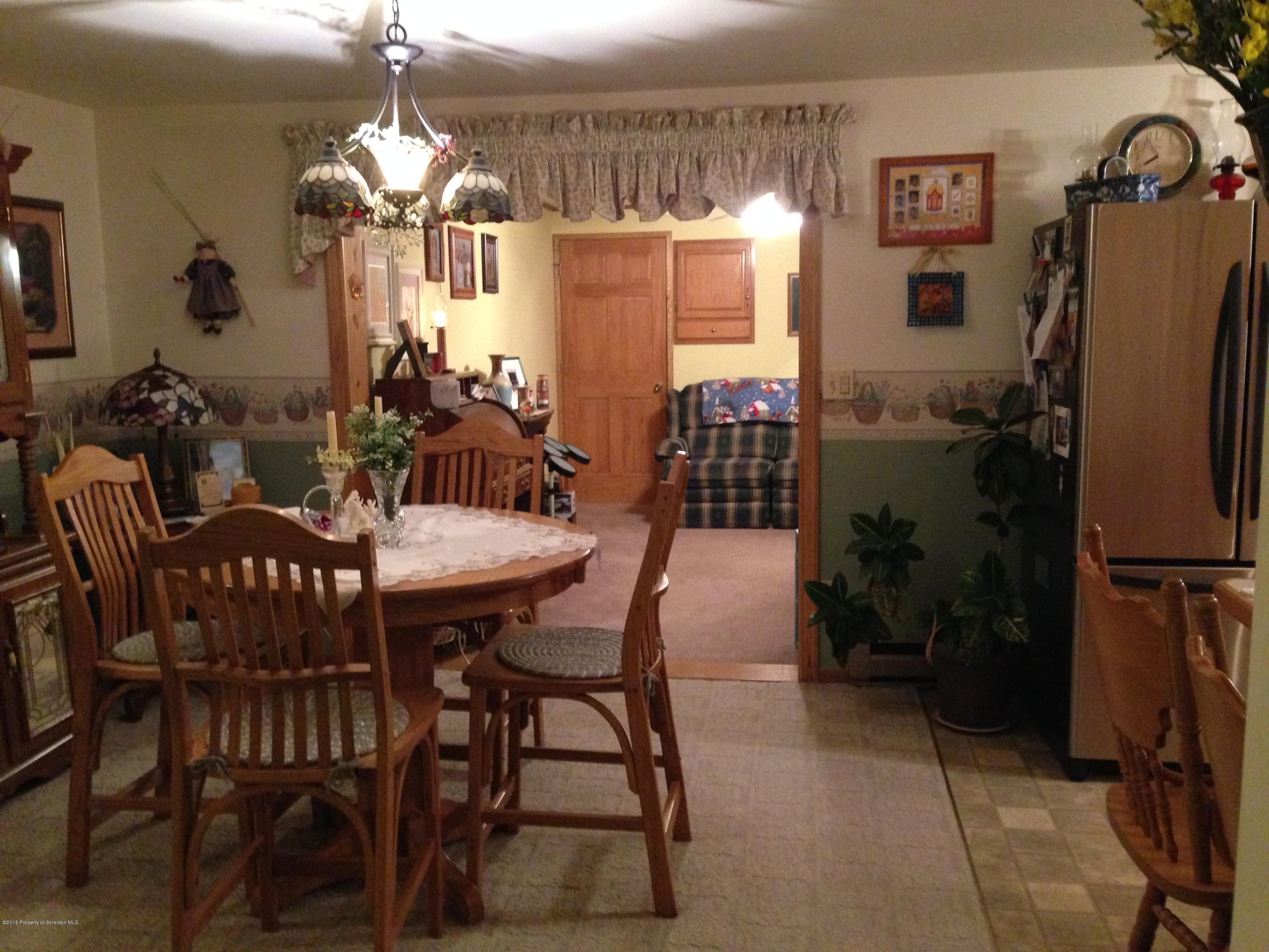 94 Depot Road Kingsley, PA 18826 - Photo 18 of 27 a view of a dining room with furniture