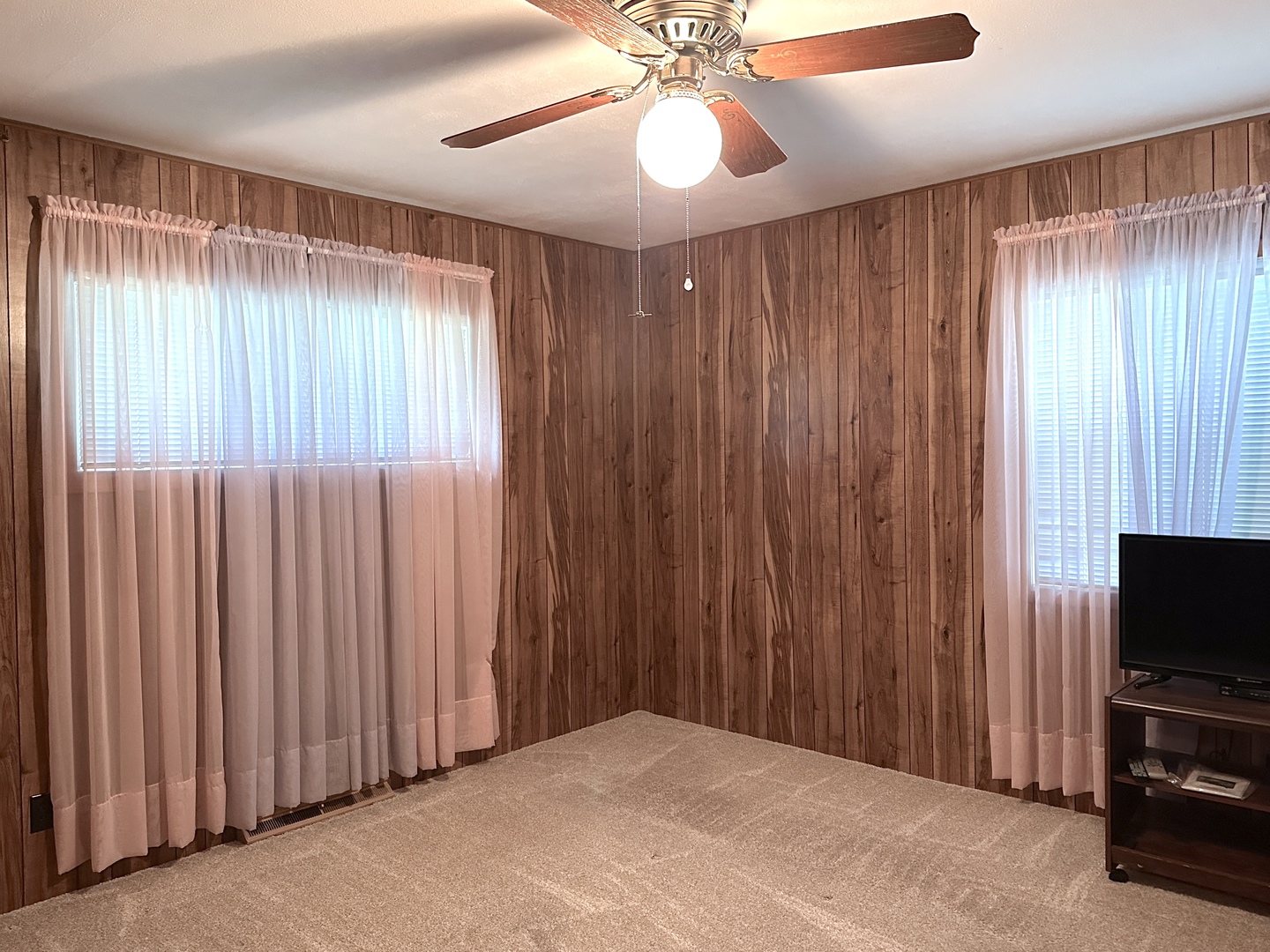 106 George Street Hurst, IL 62949 - Photo 7 of 14 a bedroom with a bed and a chandelier