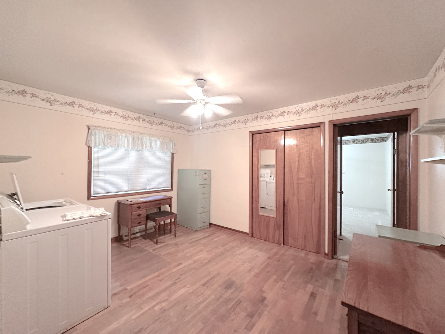 106 George Street Hurst, IL 62949 - Photo 8 of 14 a view of a room with a wooden floor