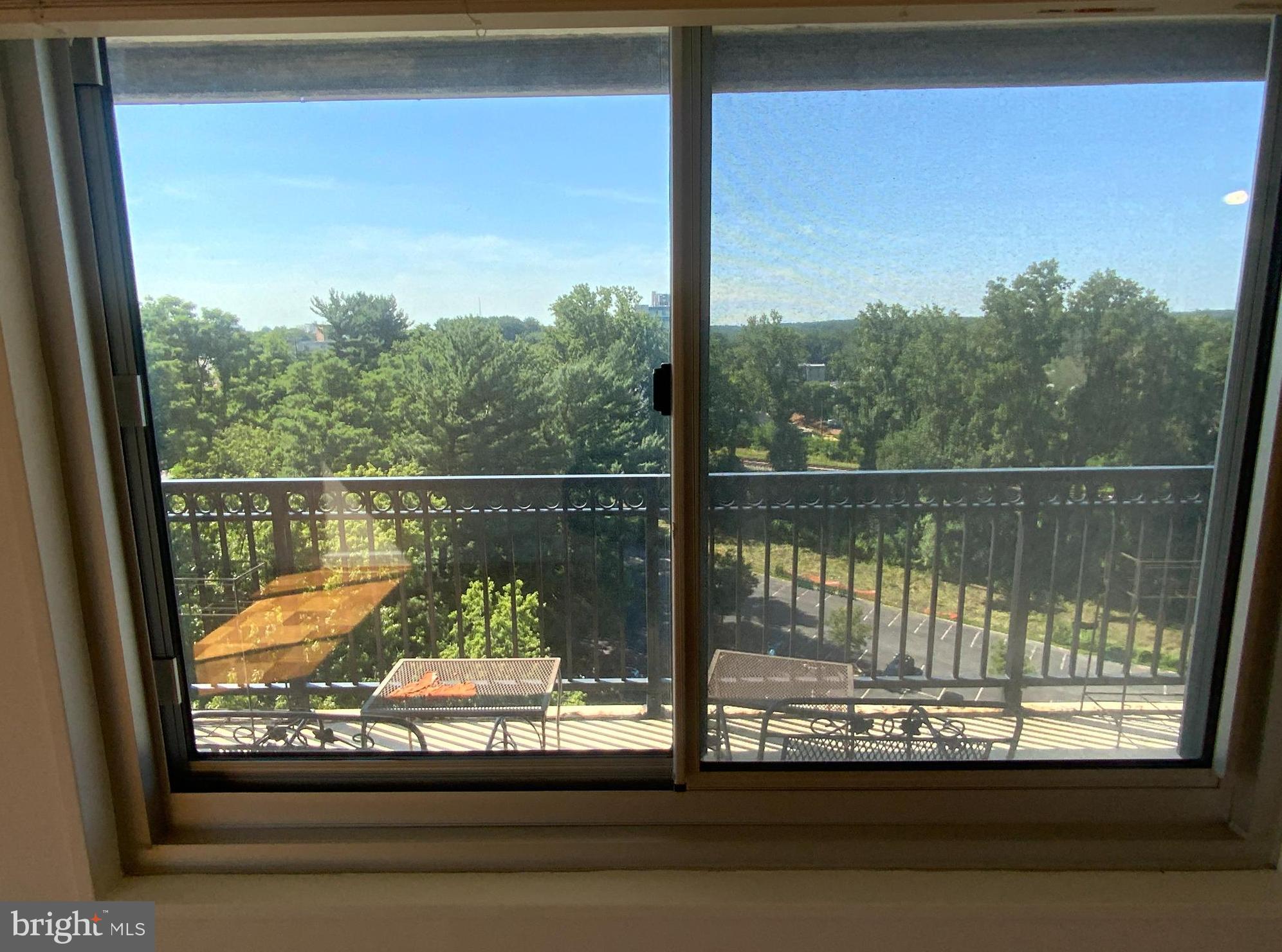 1900 Lyttonsville Road, Unit 1215 Silver Spring, MD 20910 - Photo 28 of 53 View of Balcony from the Primary Bedroom