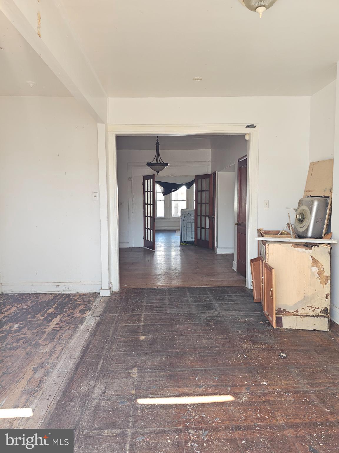 3239 Dudley Avenue Baltimore, MD 21213 - Photo 11 of 31 a view of a room with kitchen natural and wooden floor