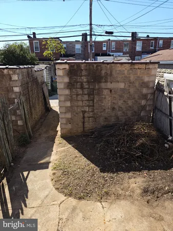 a view of a backyard of the house